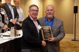 Scott Reithel receives an award