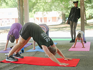 Employee teaching yoga