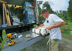 CHP Energy Solutions staff weatherize home truck