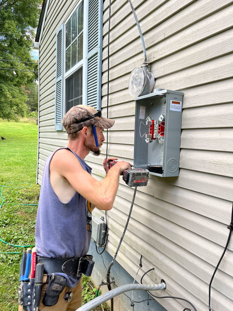 A Bradley Electric worker at Carter’s home in Elkton (September 2022)