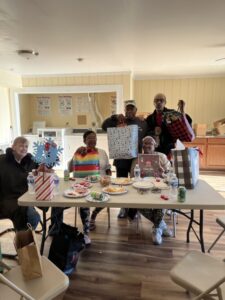 Residents receiving their warm wishes gift bags