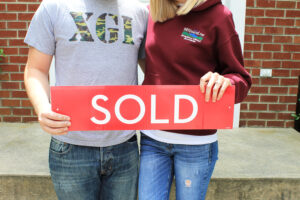 Sold sign in front of a home
