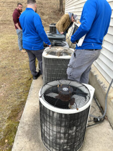 Energy Solutions employees at Glendale Apartments in Galax