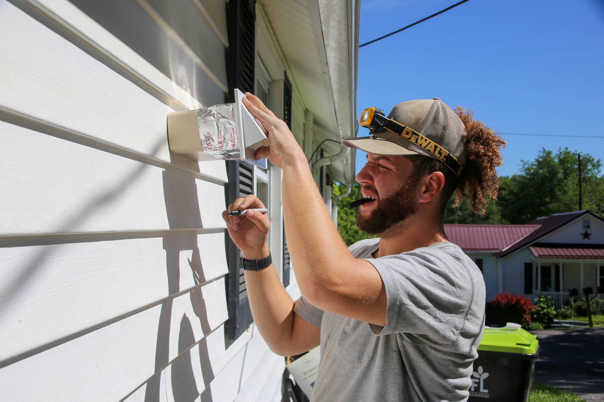 CHP's Noah Patterson working at an Energy Solutions client's home